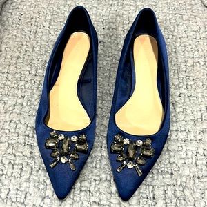 Beautiful satin finish and studded flats.